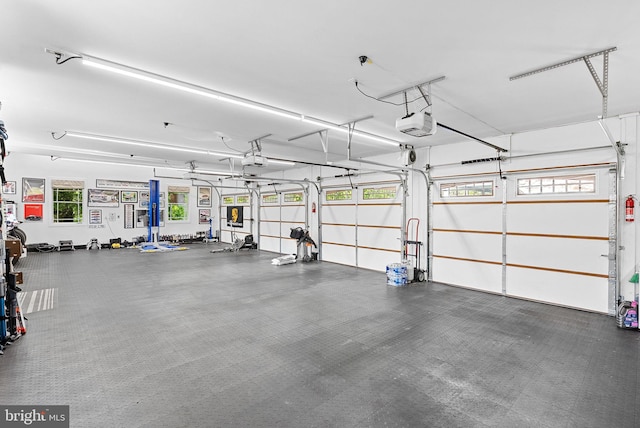 36437 Whispering Springs Ct, Purcellville, VA 20132 - garage featuring a garage door opener