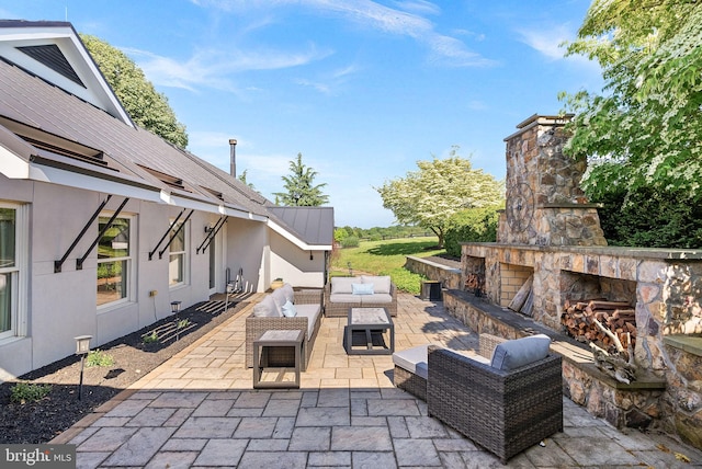 36437 Whispering Springs Ct, Purcellville, VA 20132 - view of patio / terrace featuring an outdoor living space with a fireplace