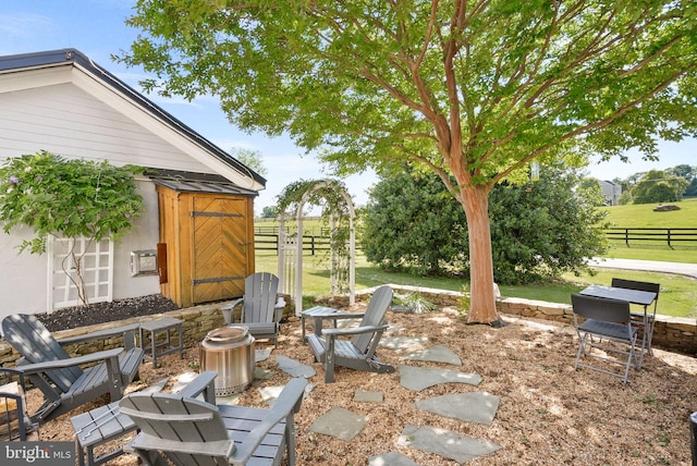 36437 Whispering Springs Ct, Purcellville, VA 20132 - view of patio featuring an outdoor fire pit