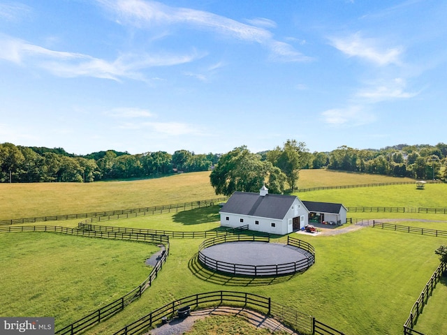 36437 Whispering Springs Ct, Purcellville, VA 20132 - view of yard with a view of rural / pastoral area, an enclosed horse arena, an outdoor structure, and an exterior structure