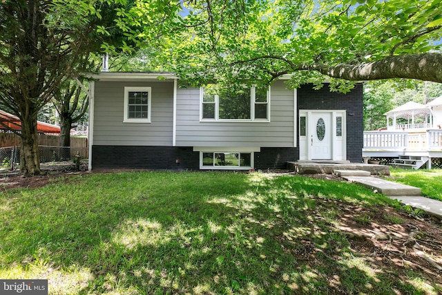 8902 Sylvania St, Lorton, VA 22079 - split foyer home featuring brick siding, a deck, and a gazebo