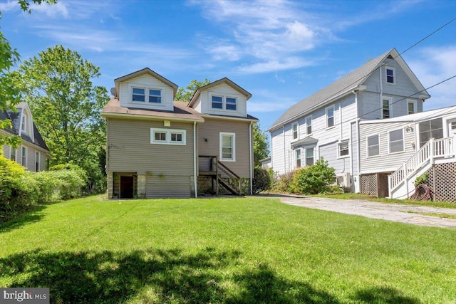 3404 Chesley Ave, Baltimore, MD 21234 - rear view of property with stairs and a yard