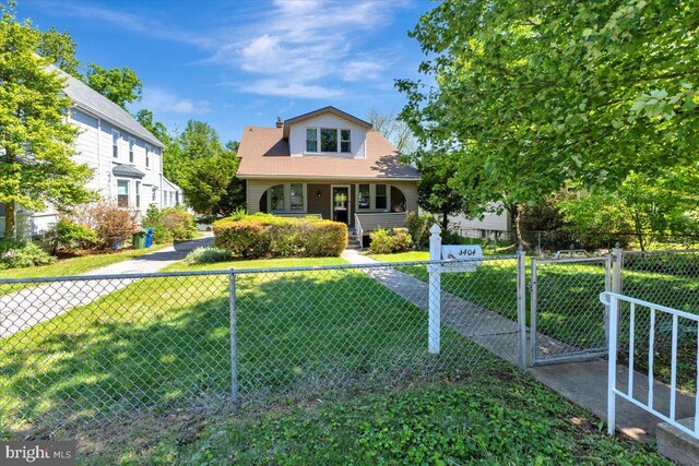 3404 Chesley Ave, Baltimore, MD 21234 - view of front of house featuring a porch and a gate