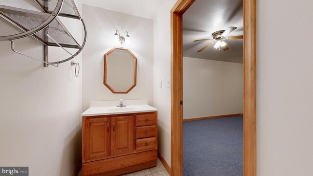 1081 Caldwell Corner Rd, Townsend, DE 19734 - bathroom with vanity, ceiling fan, and baseboards
