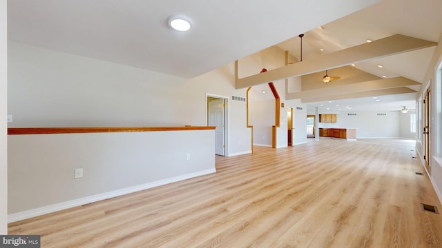 1081 Caldwell Corner Rd, Townsend, DE 19734 - unfurnished living room with a ceiling fan, visible vents, baseboards, high vaulted ceiling, and light wood-style flooring