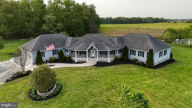 1081 Caldwell Corner Rd, Townsend, DE 19734 - exterior space with a porch, a front lawn, and concrete driveway