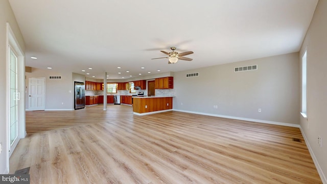 1081 Caldwell Corner Rd, Townsend, DE 19734 - unfurnished living room featuring light wood-type flooring, a ceiling fan, recessed lighting, and visible vents