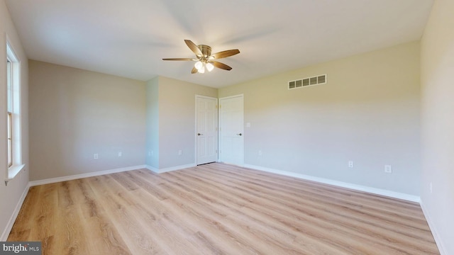 1081 Caldwell Corner Rd, Townsend, DE 19734 - spare room with a ceiling fan, baseboards, visible vents, and light wood finished floors