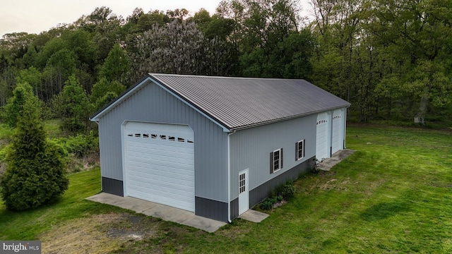 1081 Caldwell Corner Rd, Townsend, DE 19734 - detached garage featuring a wooded view