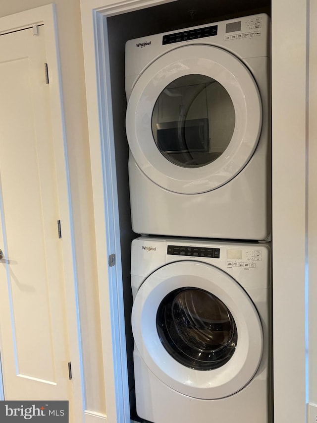 50 Florida Ave NE Unit 412, Washington, DC 20002 - clothes washing area featuring stacked washer / dryer and laundry area