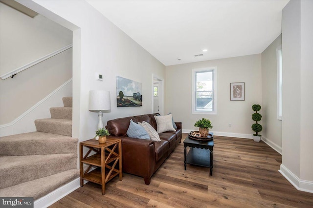 713 3rd St, Martinsburg, WV 25404 - living area featuring visible vents, baseboards, recessed lighting, stairway, and wood finished floors