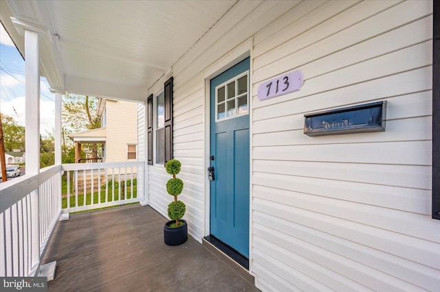 713 3rd St, Martinsburg, WV 25404 - entrance to property with a porch