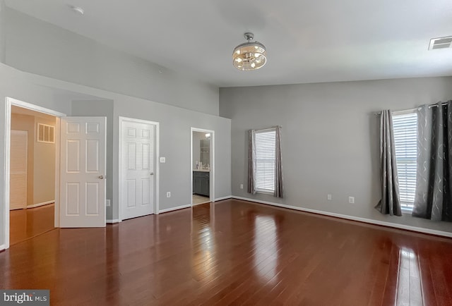 920 Pine Forest Ln Unit 1812, Upper Marlboro, MD 20774 - unfurnished bedroom with visible vents, wood finished floors, and vaulted ceiling