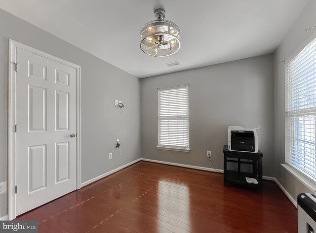 920 Pine Forest Ln Unit 1812, Upper Marlboro, MD 20774 - unfurnished bedroom featuring visible vents, baseboards, and wood finished floors