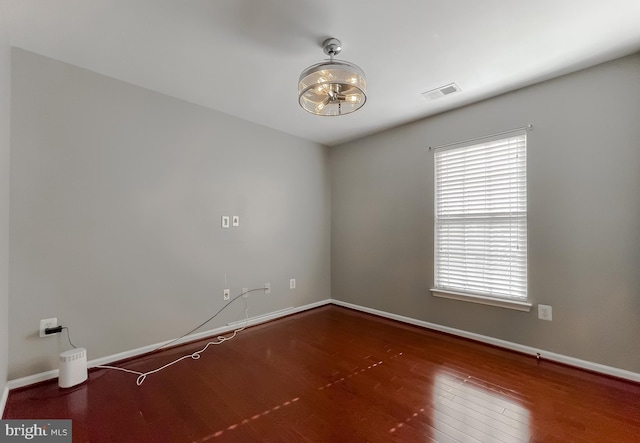 920 Pine Forest Ln Unit 1812, Upper Marlboro, MD 20774 - unfurnished room featuring baseboards, visible vents, and wood finished floors