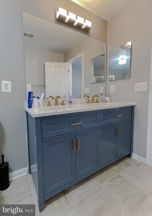 920 Pine Forest Ln Unit 1812, Upper Marlboro, MD 20774 - bathroom featuring baseboards, visible vents, and vanity