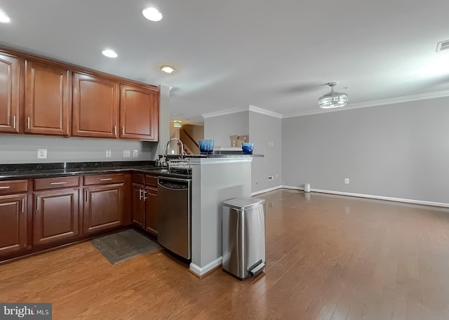 920 Pine Forest Ln Unit 1812, Upper Marlboro, MD 20774 - kitchen featuring light wood-type flooring, ornamental molding, a sink, and dishwasher