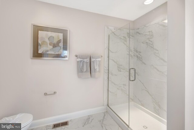 126 Green Forest Dr Unit 5Houston, Middletown, DE 19709 - bathroom featuring visible vents, baseboards, toilet, marble finish floor, and a marble finish shower