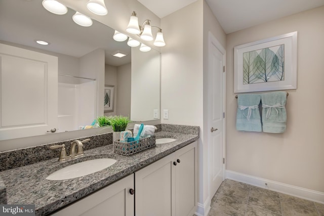 126 Green Forest Dr Unit 5Houston, Middletown, DE 19709 - full bath with double vanity, baseboards, and a sink
