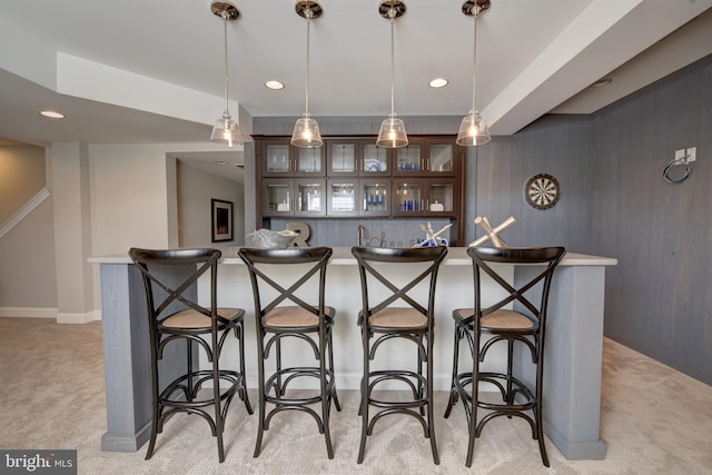126 Green Forest Dr Unit 5Houston, Middletown, DE 19709 - bar with light colored carpet, pendant lighting, baseboards, and indoor wet bar