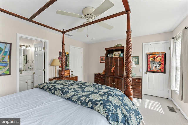 bedroom with carpet, visible vents, a ceiling fan, and multiple windows
