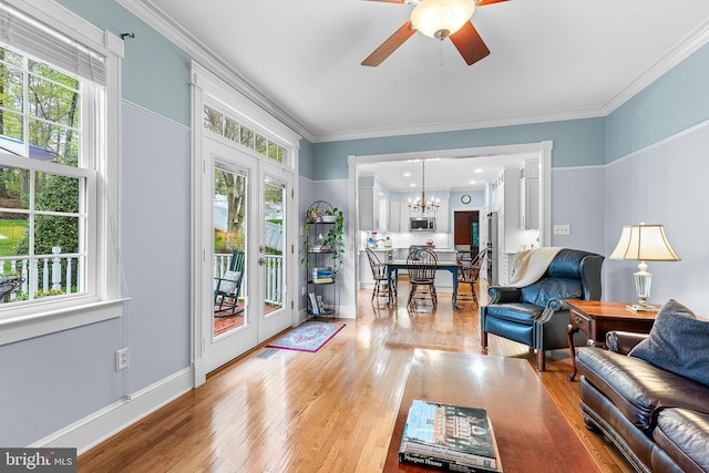 26 Blossom Wood Ct, Stafford, VA 22554 - living area featuring a wealth of natural light, light wood-type flooring, and crown molding