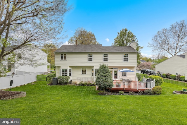 26 Blossom Wood Ct, Stafford, VA 22554 - rear view of property with a yard, a fenced backyard, central AC unit, a chimney, and a deck