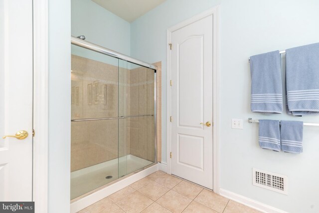 106 Mahogany Way, Upper Gwynedd, PA 19446 - bathroom featuring tile patterned flooring, visible vents, and a stall shower
