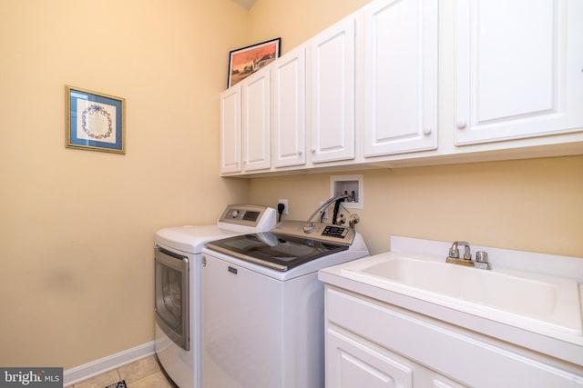 106 Mahogany Way, Upper Gwynedd, PA 19446 - laundry room with a sink, baseboards, cabinet space, washer and dryer, and light tile patterned floors