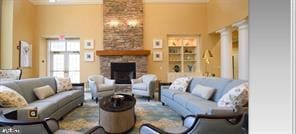 106 Mahogany Way, Upper Gwynedd, PA 19446 - living room featuring a fireplace, a towering ceiling, and ornate columns