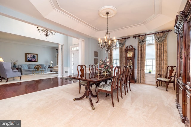 106 Mahogany Way, Upper Gwynedd, PA 19446 - dining space featuring a raised ceiling, ornamental molding, a chandelier, and decorative columns