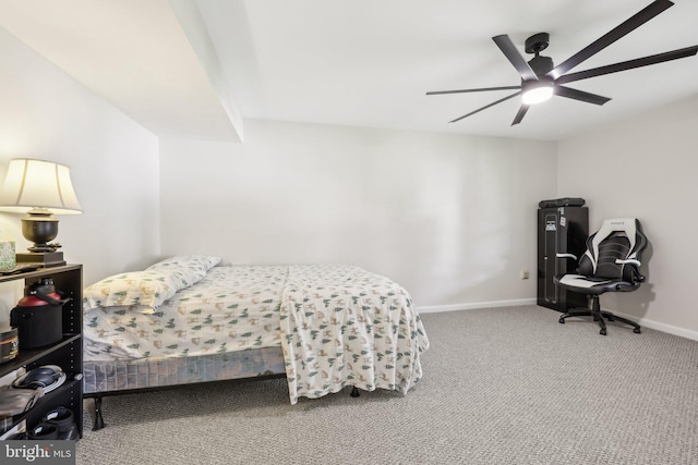 bedroom with baseboards, a ceiling fan, and carpet flooring