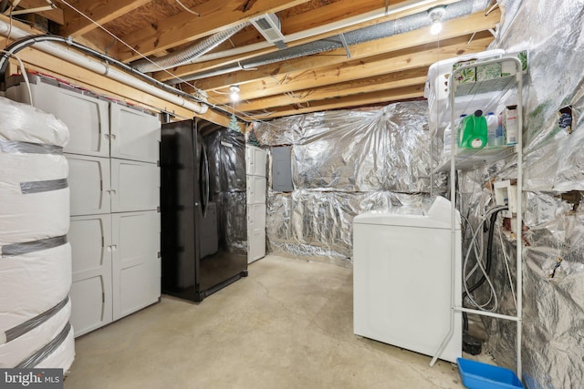 unfinished basement with washer and dryer and electric panel