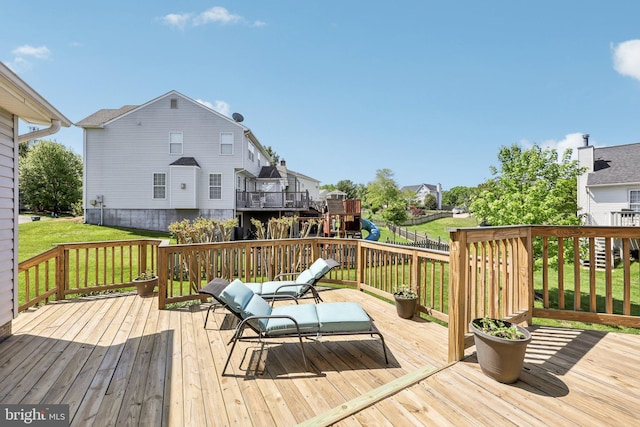 deck featuring a lawn