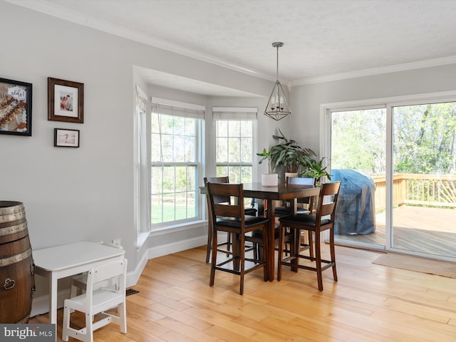 2311 Crosslanes Way, Odenton, MD 21113 - dining room featuring light wood-style flooring, crown molding, and baseboards