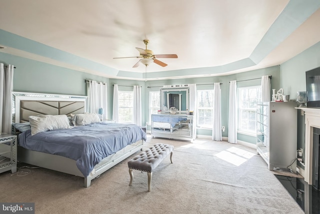 14165 Shelwick Pl, Hughesville, MD 20637 - bedroom with a ceiling fan, carpet flooring, multiple windows, and a tray ceiling