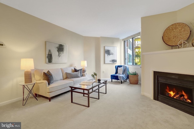 851 N Glebe Rd Unit 321, Arlington, VA 22203 - living area with baseboards, a lit fireplace, and carpet