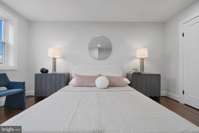133 Ingraham St NW, Washington, DC 20011 - bedroom with dark wood-type flooring and baseboards