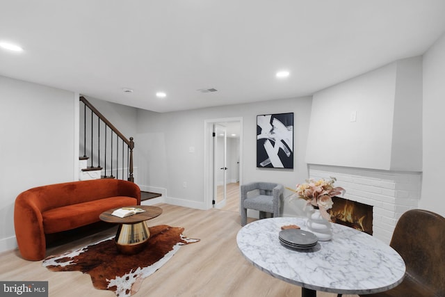 133 Ingraham St NW, Washington, DC 20011 - living room featuring visible vents, light wood-style flooring, recessed lighting, and stairs