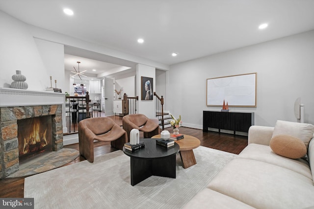 133 Ingraham St NW, Washington, DC 20011 - living area featuring wood finished floors, recessed lighting, a fireplace, and stairway