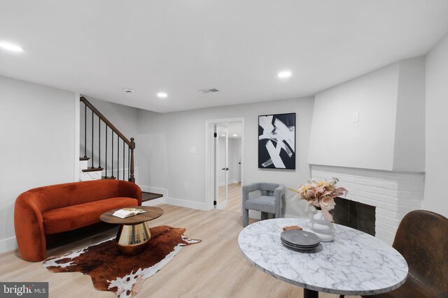 133 Ingraham St NW, Washington, DC 20011 - living room featuring recessed lighting, stairway, light wood-style floors, and visible vents