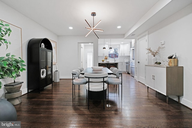 133 Ingraham St NW, Washington, DC 20011 - dining area with recessed lighting, baseboards, and dark wood finished floors