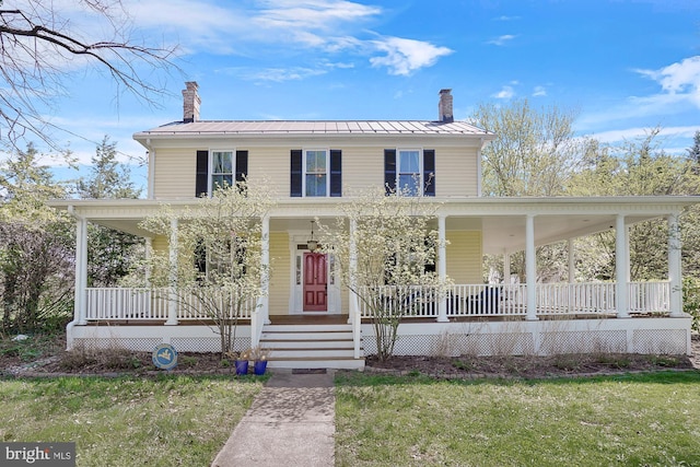 17811 Elgin Rd, Poolesville, MD 20837 - farmhouse inspired home with a porch, a chimney, and a front lawn