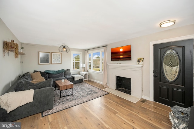 522 White Oak Rd, Fredericksburg, VA 22405 - living room featuring a fireplace, baseboards, and wood finished floors