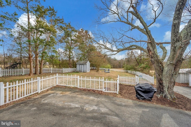522 White Oak Rd, Fredericksburg, VA 22405 - view of patio / terrace with a storage shed, an outbuilding, and fence private yard