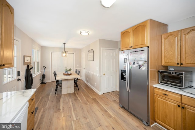 522 White Oak Rd, Fredericksburg, VA 22405 - kitchen featuring baseboards, stainless steel refrigerator with ice dispenser, white dishwasher, light countertops, and light wood-style flooring