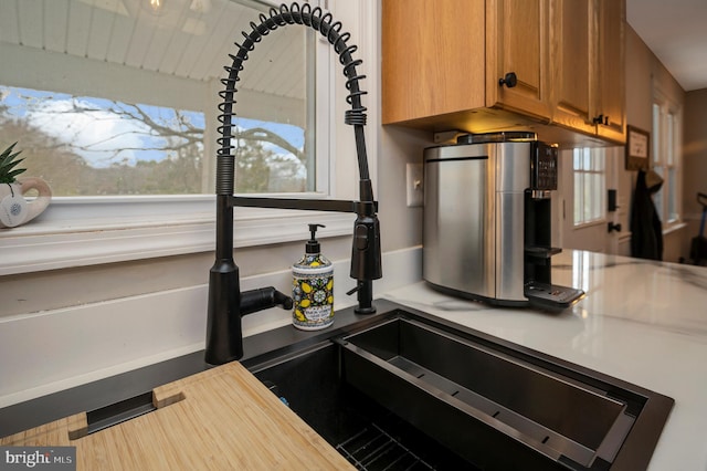 522 White Oak Rd, Fredericksburg, VA 22405 - details with brown cabinets and light countertops