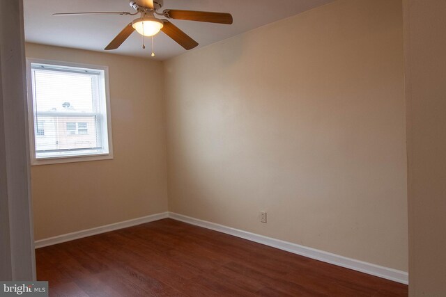 7834 Fayette St, Philadelphia, PA 19150 - unfurnished room featuring dark wood-type flooring, baseboards, and ceiling fan
