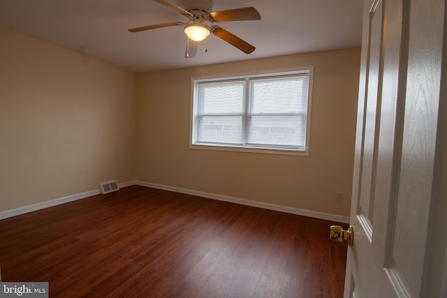 7834 Fayette St, Philadelphia, PA 19150 - spare room featuring dark wood-style flooring, visible vents, baseboards, and ceiling fan
