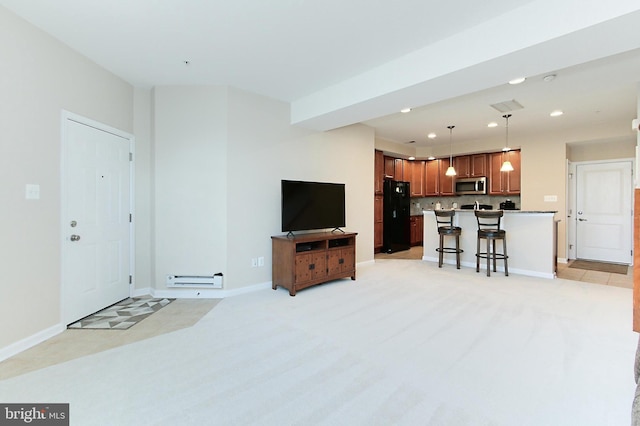 living room with visible vents, baseboards, recessed lighting, and light colored carpet